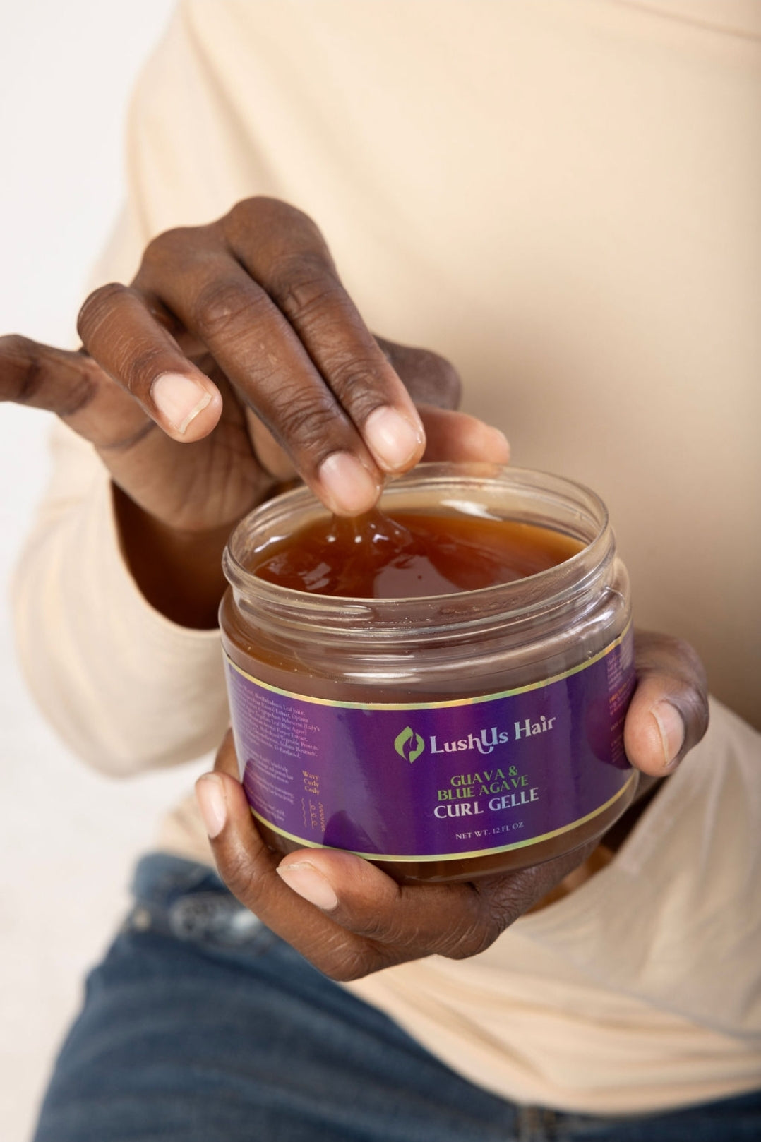 Smooth, flexible texture of Guava & Blue Agave Curl Gelle, designed for enhanced curl definition and frizz control.